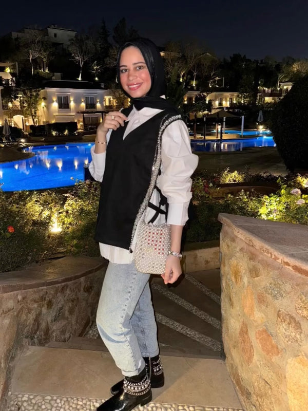 The Embroidered Black Vest worn by a LAYAN customer