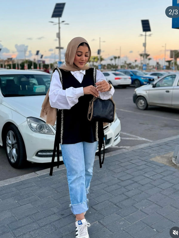 The Embroidered Black Vest worn by a LAYAN customer